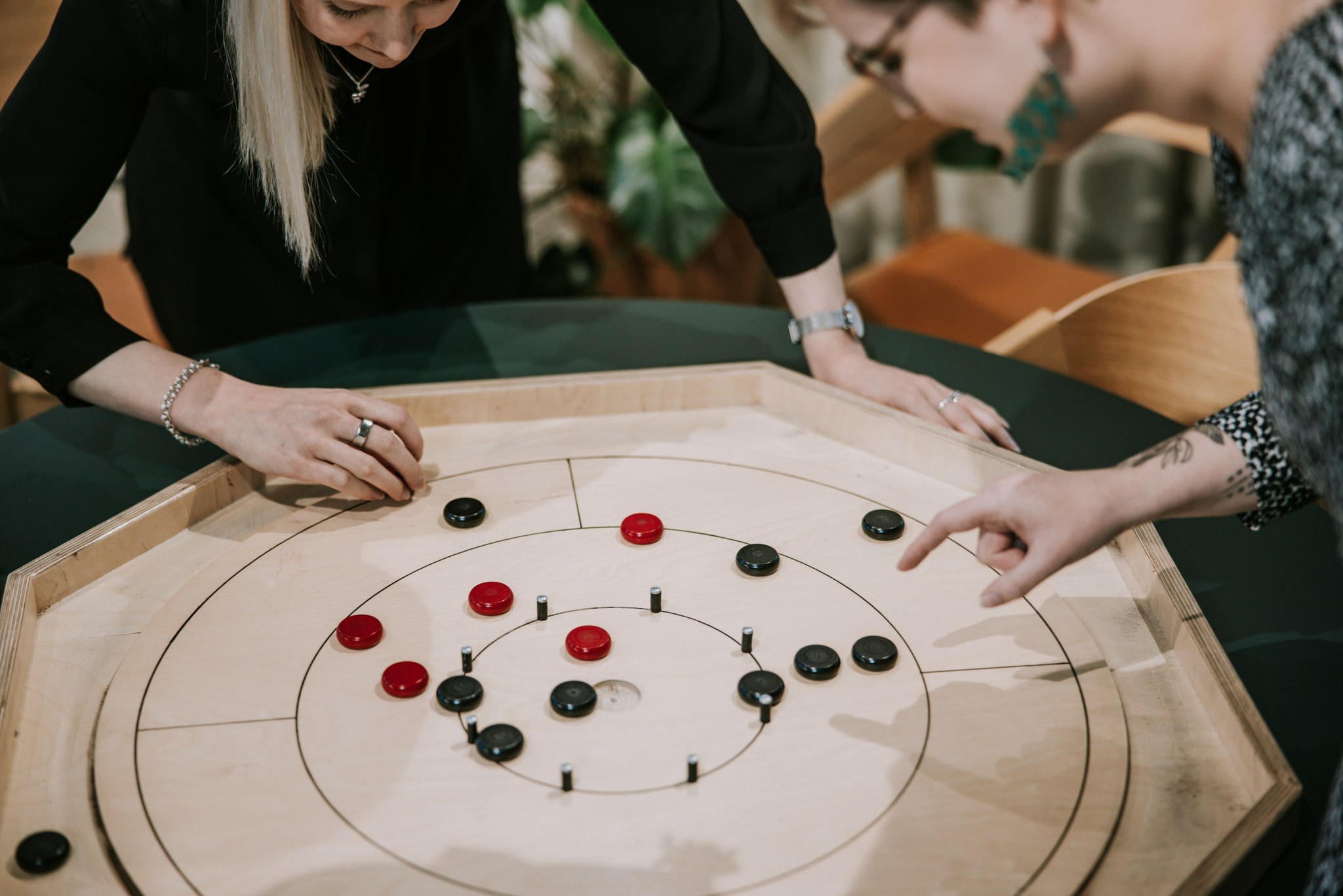 A game board with black and red pieces